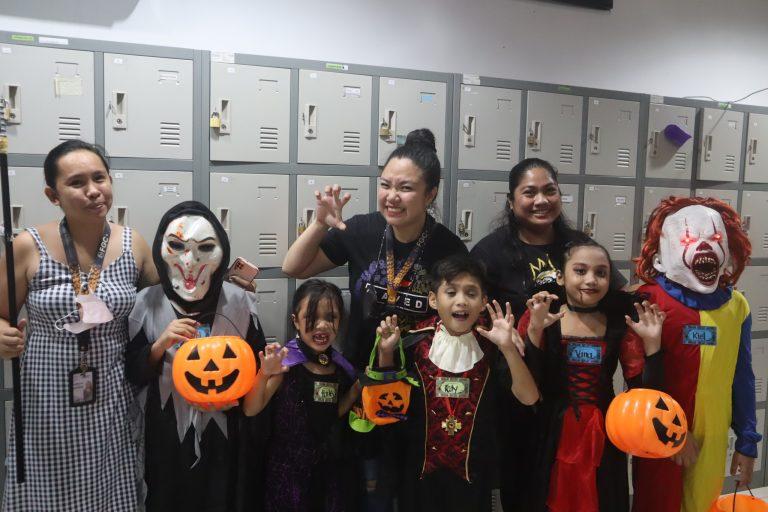 Our pros celebrating Halloween with some spooky little visitors