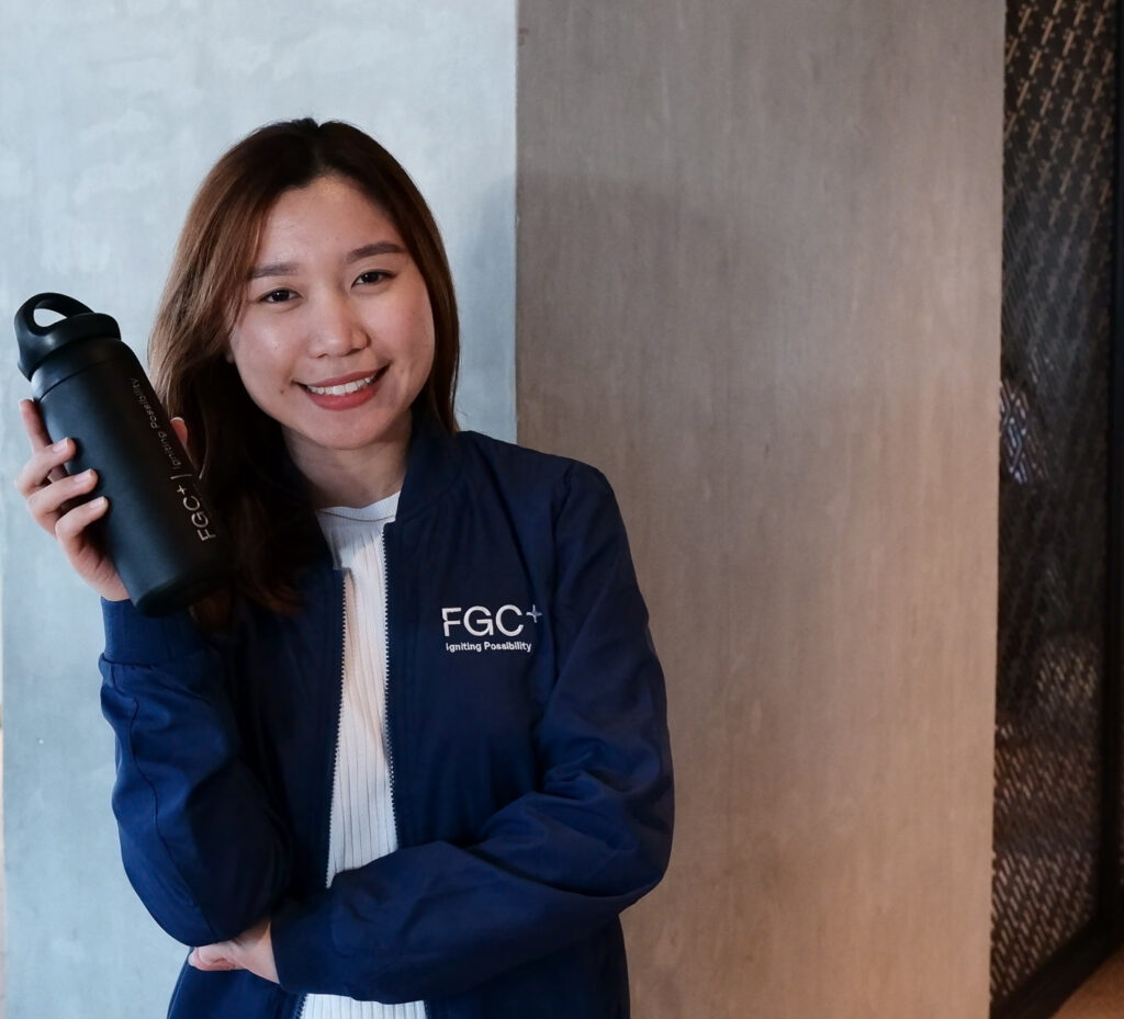 FGC employee holding a water bottle