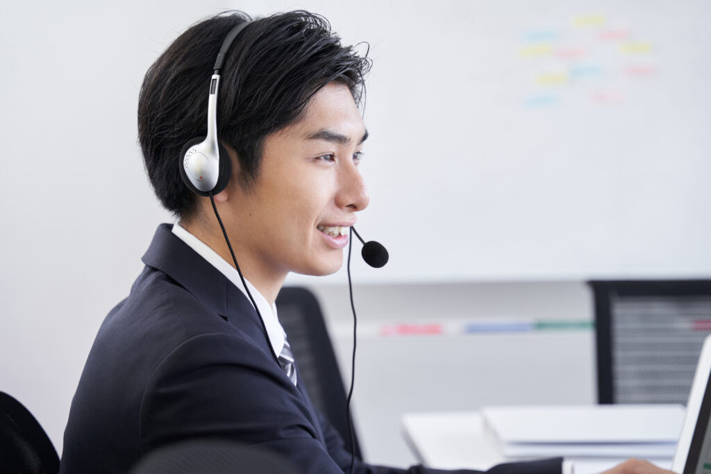 The current image has no alternative text. The file name is: a-japanese-male-businessman-in-his-office-answerin-2025-03-15-02-55-38-utc-scaled.jpg